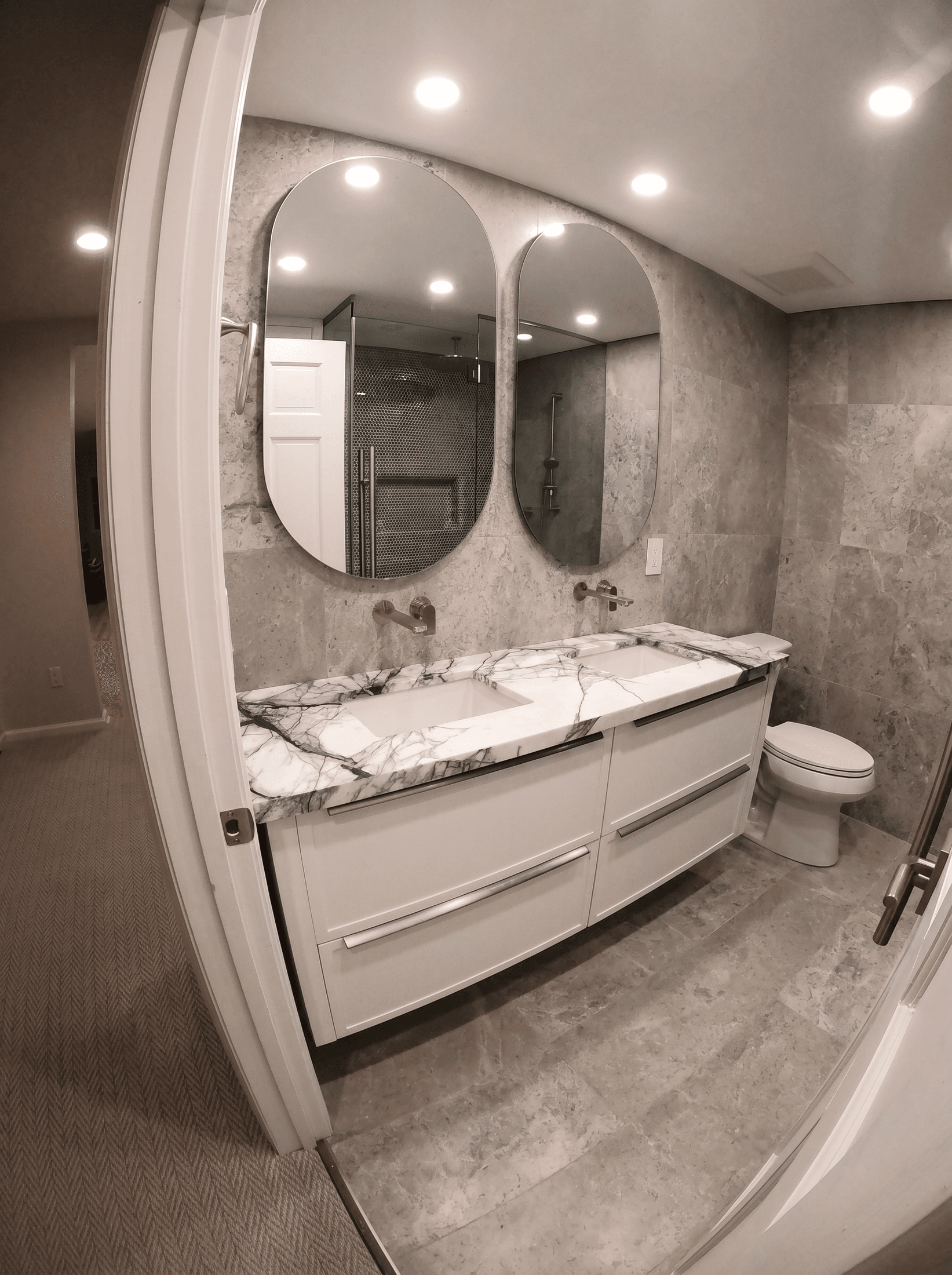 Marble Vanity with Arched Mirrors