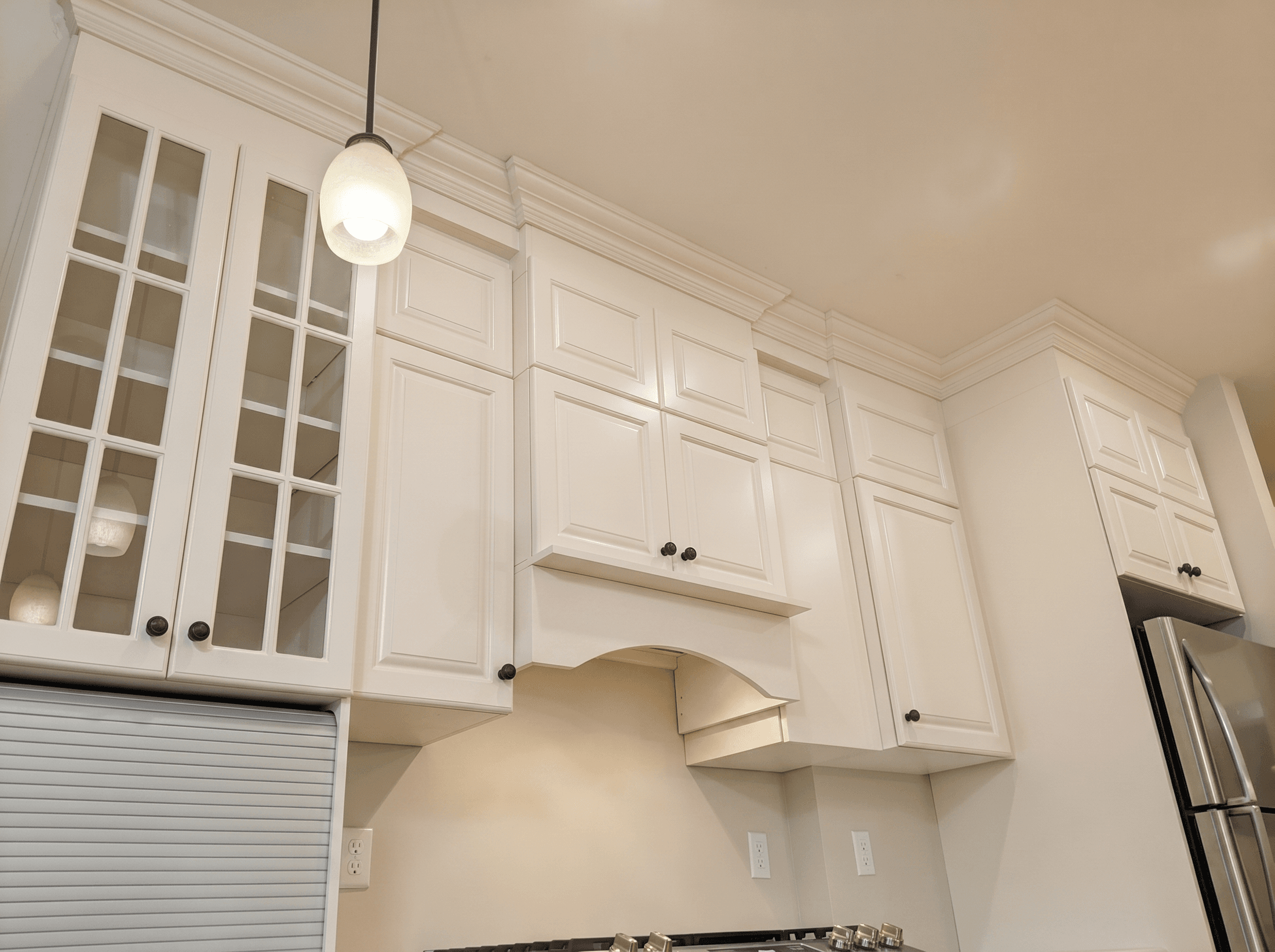 Cream Raised Panel Cabinet Wall